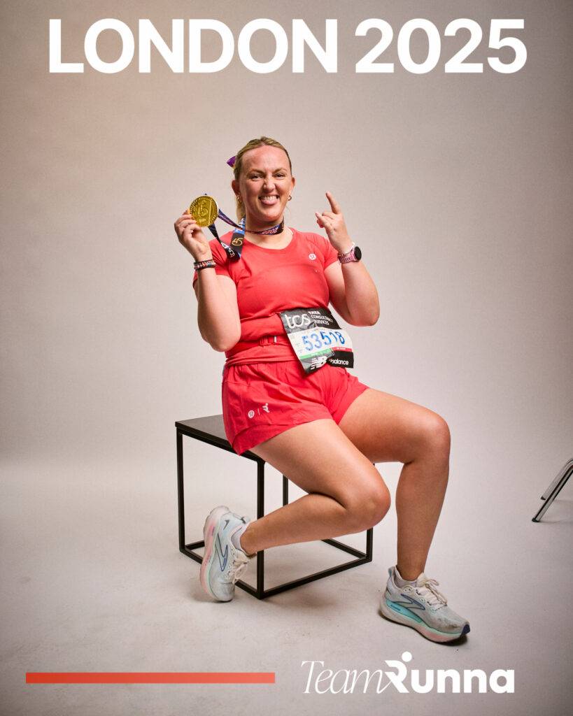 Photo of Jenny Mannion posing with a gold medal.